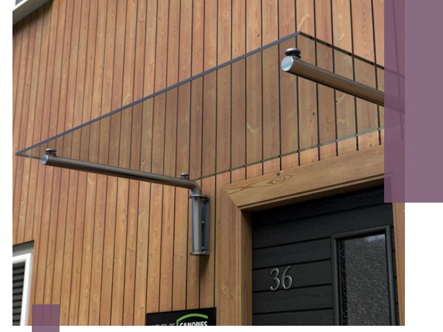 Стеклянные козырьки на входы и фасады в Лесозаводске